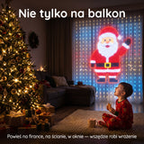 Dziecko patrzy na świąteczną projekcję Mikołaja z kurtyny LED